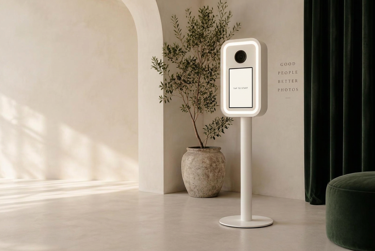 Frame Society photo booth in a minimalist ivory room